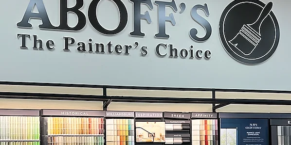 The color chip wall under the Aboff's sign inside an Aboff's Paints store