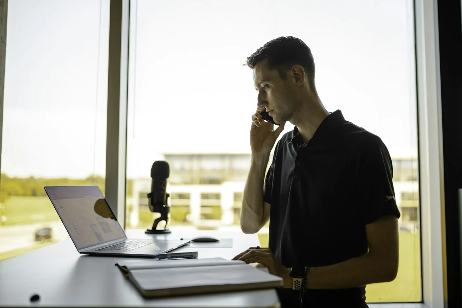 A business owner taking a call at the office