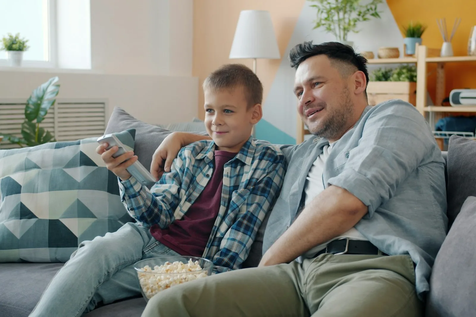 Two people streaming television at home