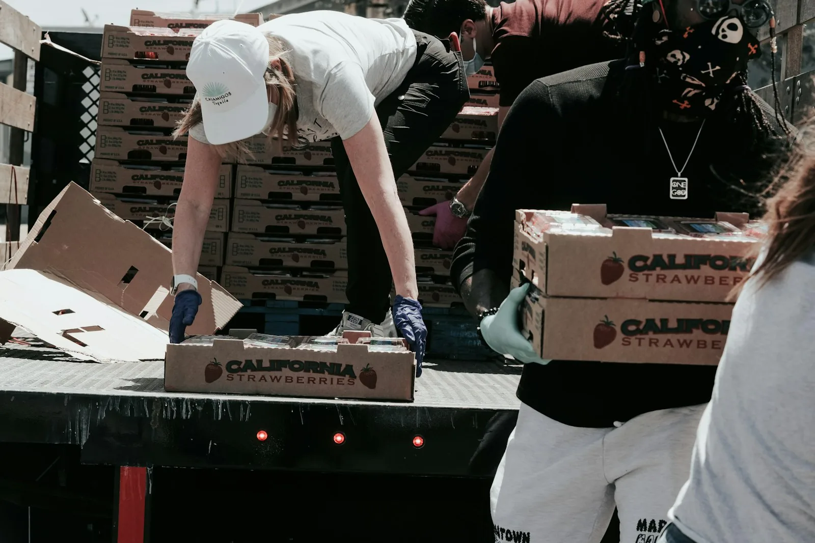 A crew loading a delivery truck