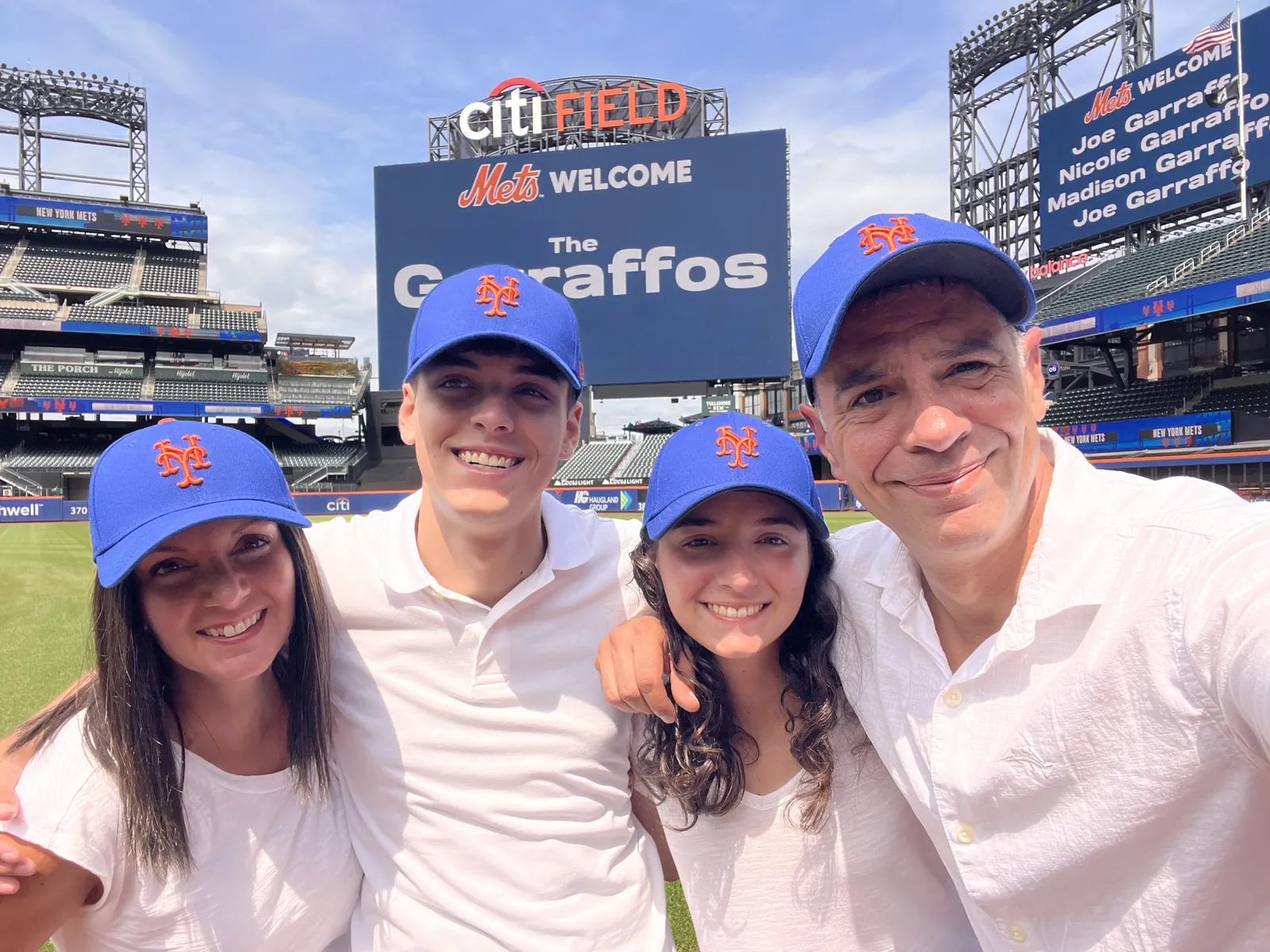 Joe and Nicole Garraffo with their family at Citi Field